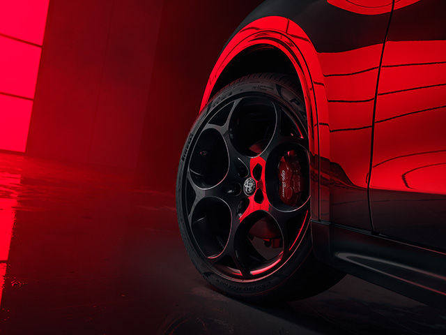 Dark 21" alloy wheels with Brembo brake calipers